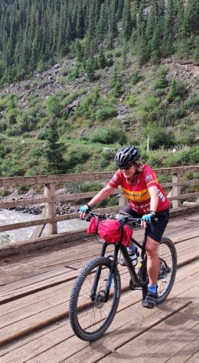 Clare Elsegood Cycling on the  tour with redspokes